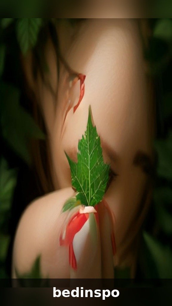 Candy cane striped nails with holly leaf and berry accents